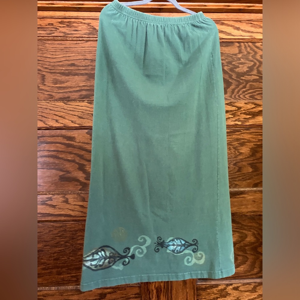 Blue fish long green skirt with beautiful block print designs.